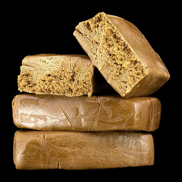 Bubble Hash 50% THCA block with soft pressed texture