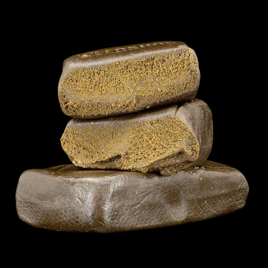 Farfar's Favorit 30% THCA glasshouse hash with dark compact texture