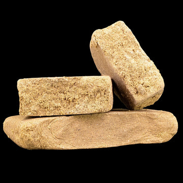 La Mousse THCA hash block with light brown drysift texture